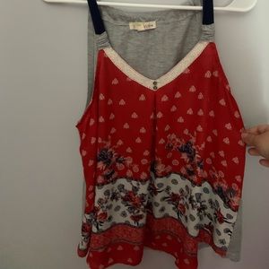 patterned orange shirt